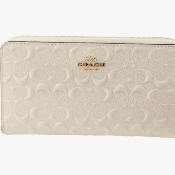 Coach Handbags - Coach Ivory Embossed Wallet